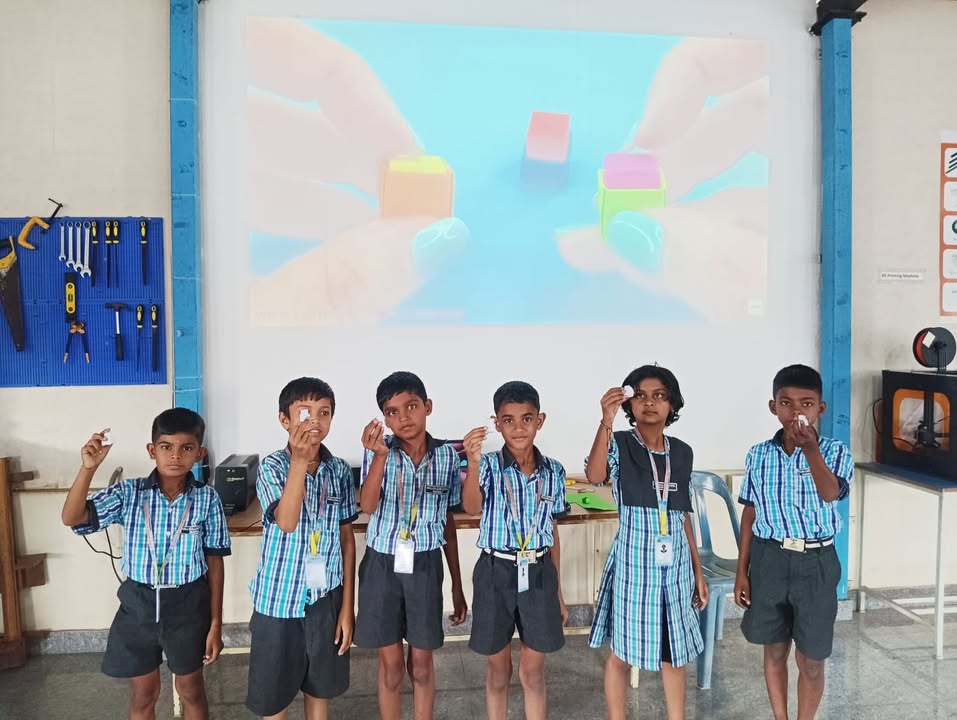 Activity - primary school children are showcasing Mini origami Paper Button Toys which they have…